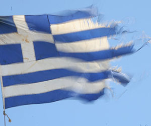 torn greece flag